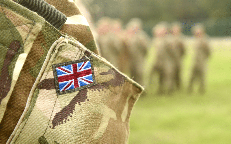 A close up of an army jacket with the Union Jack in view. Demonstrating the value of practical experience in learning and development.